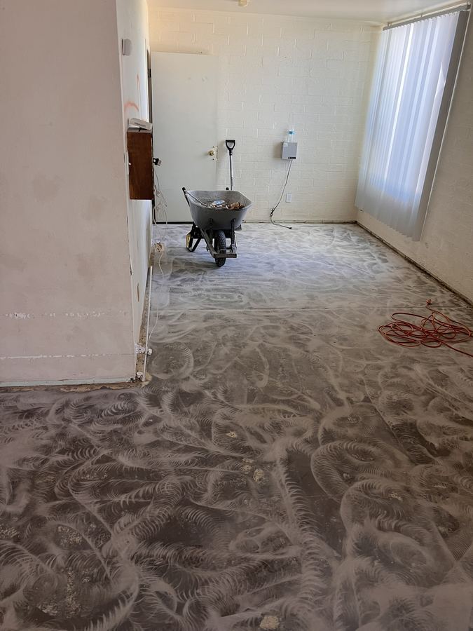 Old flooring removed, subfloor ground clean